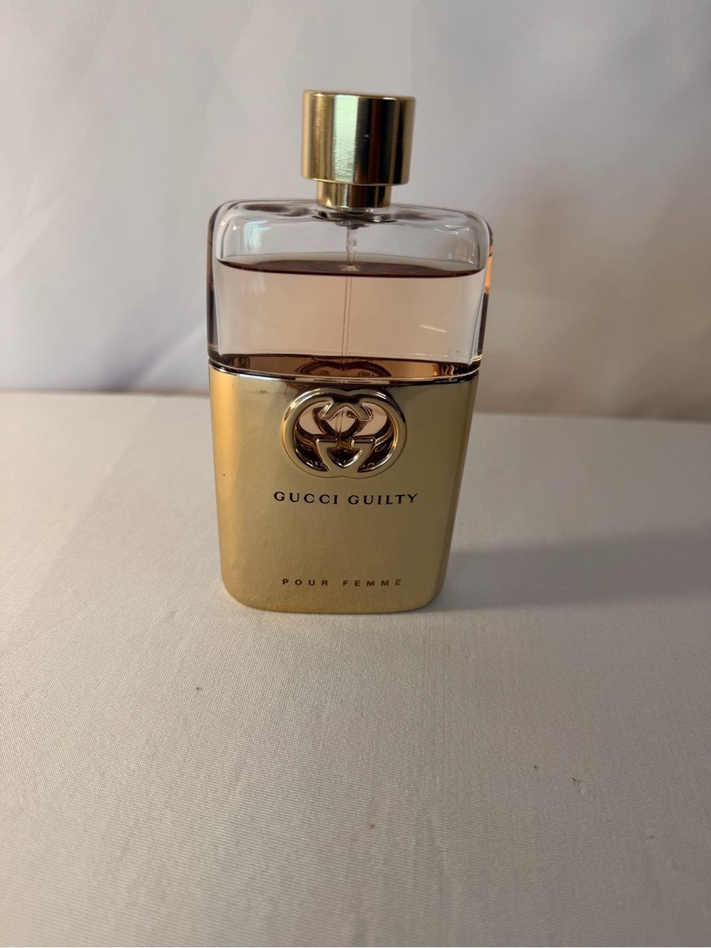 Gucci Guilty Pour Femme Gold Bottle with Clear Top